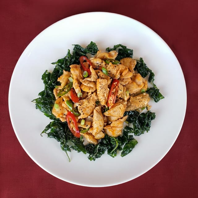 F12. Sautéed Sliced Chicken with Hot Pepper and Crispy Spinach.