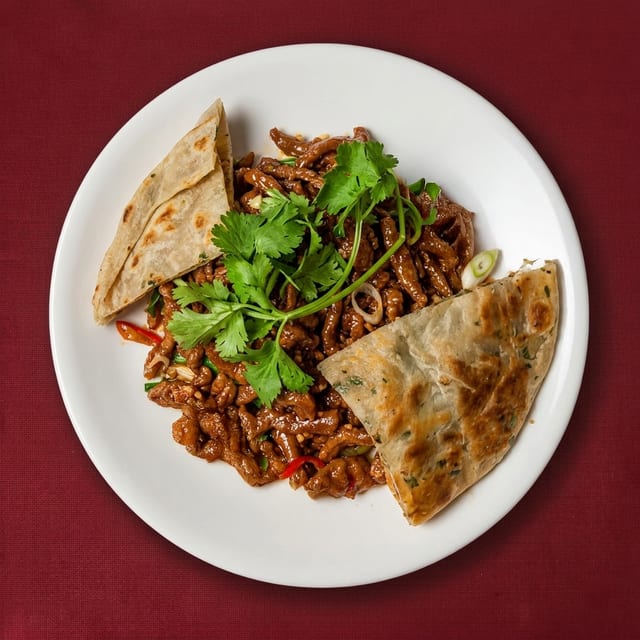 F17. Dried Sautéed Shredded Beef Szechuan Style.